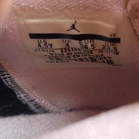 Air Jordan 6 Rings Black and Pink Foam Sneakers