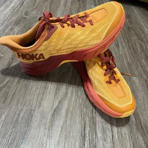Hoka Orange and Red Running Shoes (sample shoe) Speedgoat 5