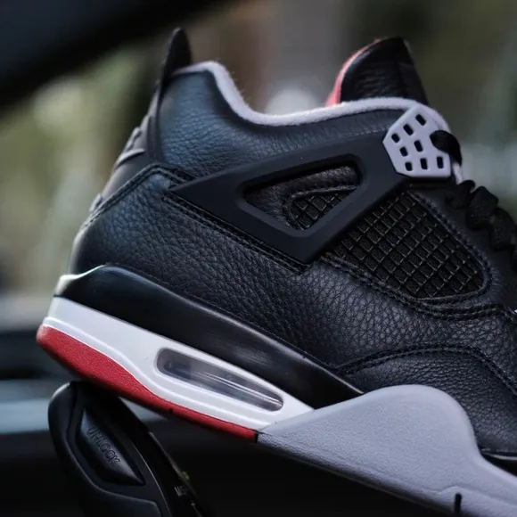 Nike Black and Red Sneakers with Air Cushioning