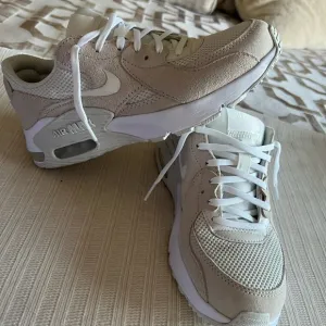 Nike Cream and White Sneakers Modern Design