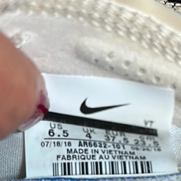 Nike Cream Sneakers with Woven Upper and Cushioned Sole
