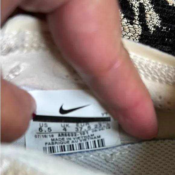Nike Cream Sneakers with Woven Upper and Cushioned Sole