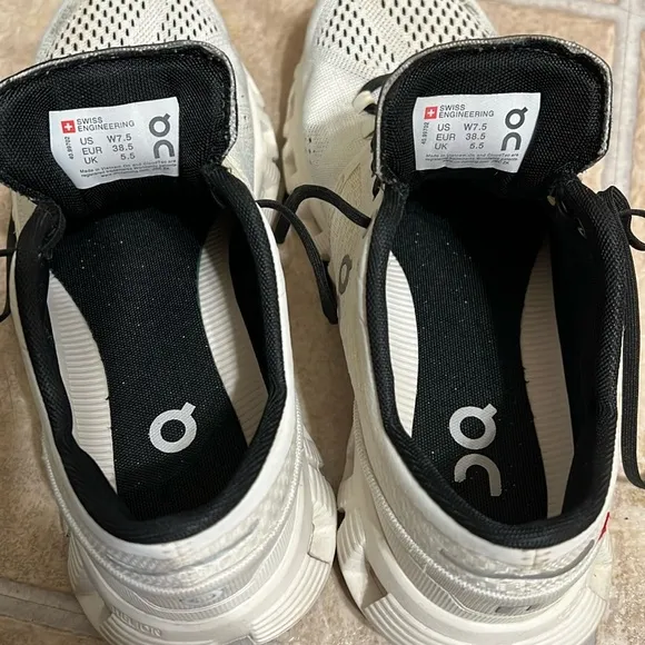 On Running Black and White Athletic Shoes