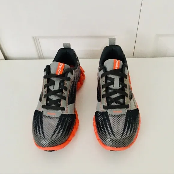 Reebok Shark Zigtech Kids Black and Orange Shoes
