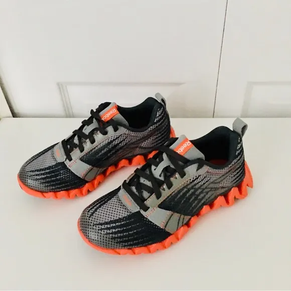 Reebok Shark Zigtech Kids Black and Orange Shoes