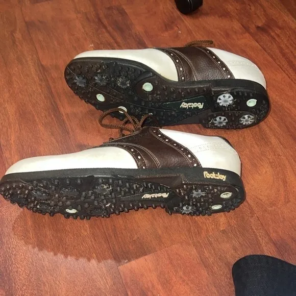 size 8 1/2 men’s brown and white foot joy golf shoes